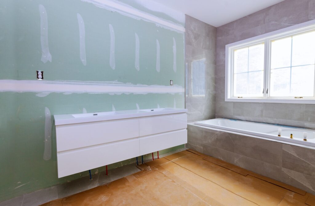 Construction details with industry renovation shower in tiled bathroom with molding windows