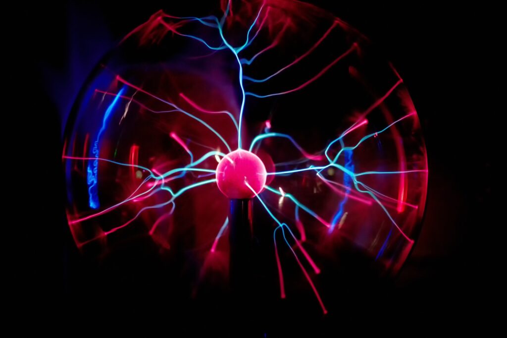 Electric plasma ball on a dark background. Static electricity model
