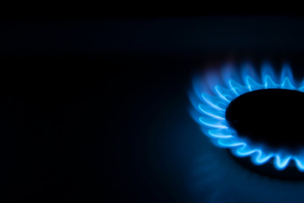 Side view of the flame from gas stove with black background