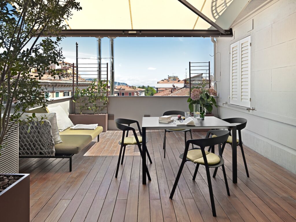 modern dining table and the sofa in the terrace