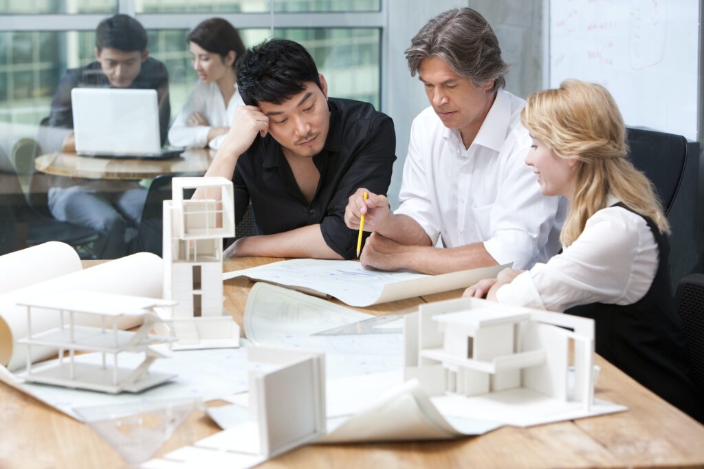 Architects studying a blueprint