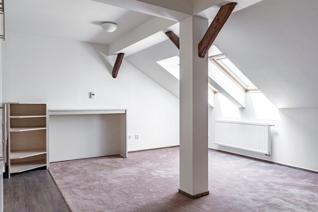 attic apartment with furniture in a modern building