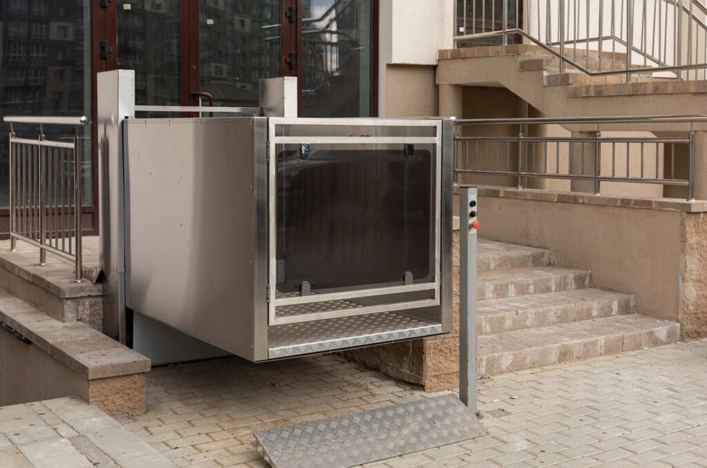 Cutting-edge metal city stair lift, platform lift, disabled persons lift outside apartment building