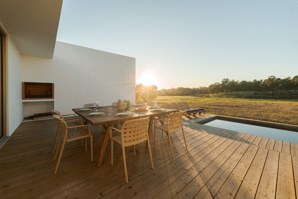 Dinner table setting in modern villa terrace
