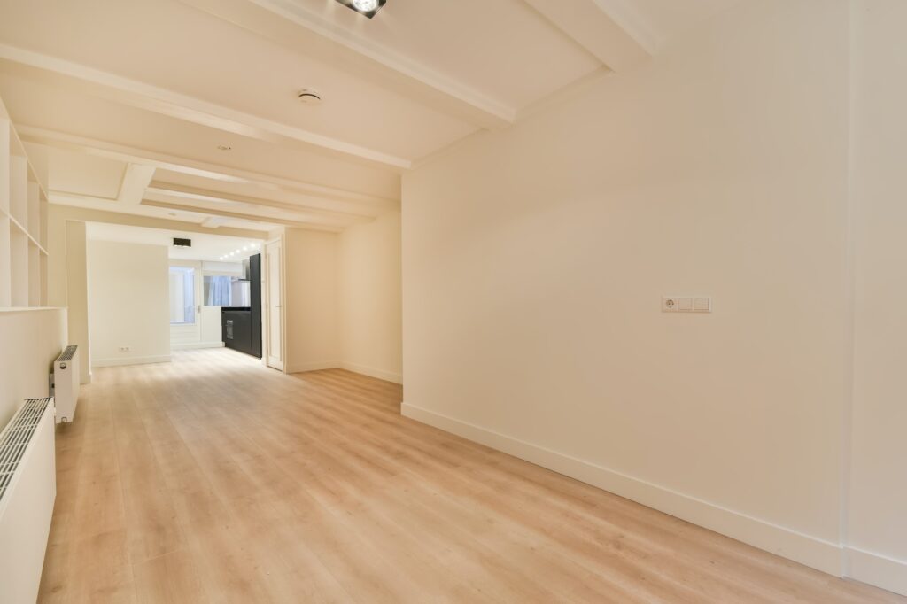 Empty interior with wall bookcase