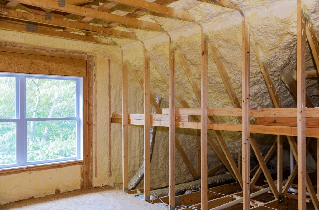 Insulation insulation of a new building with foam attic of an apartment building,
