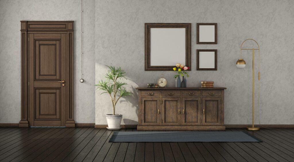 Retro home entance with wooden sideboard and closed door