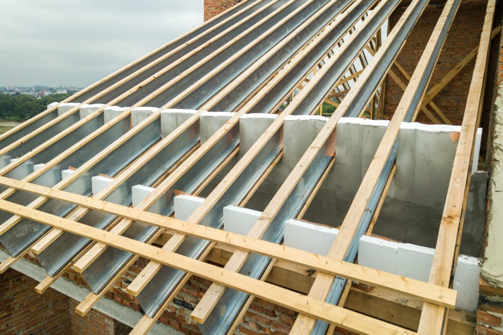 Stainless steel roof structure for future roof under construction. Development of metal roofing