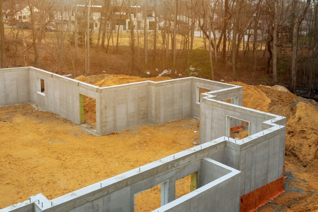 Waterproofing foundation insulation with polystyrene foam boards for house energy saving